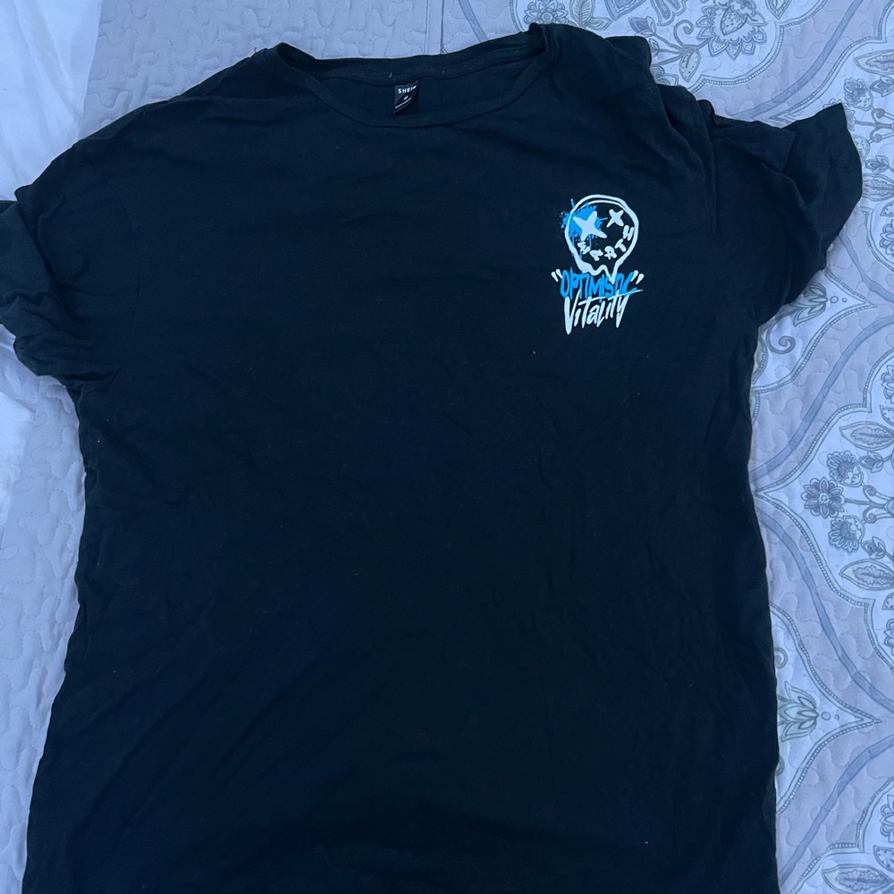 Graphic tee shirt from Romwe , Color black white and blue . Size Medium ,